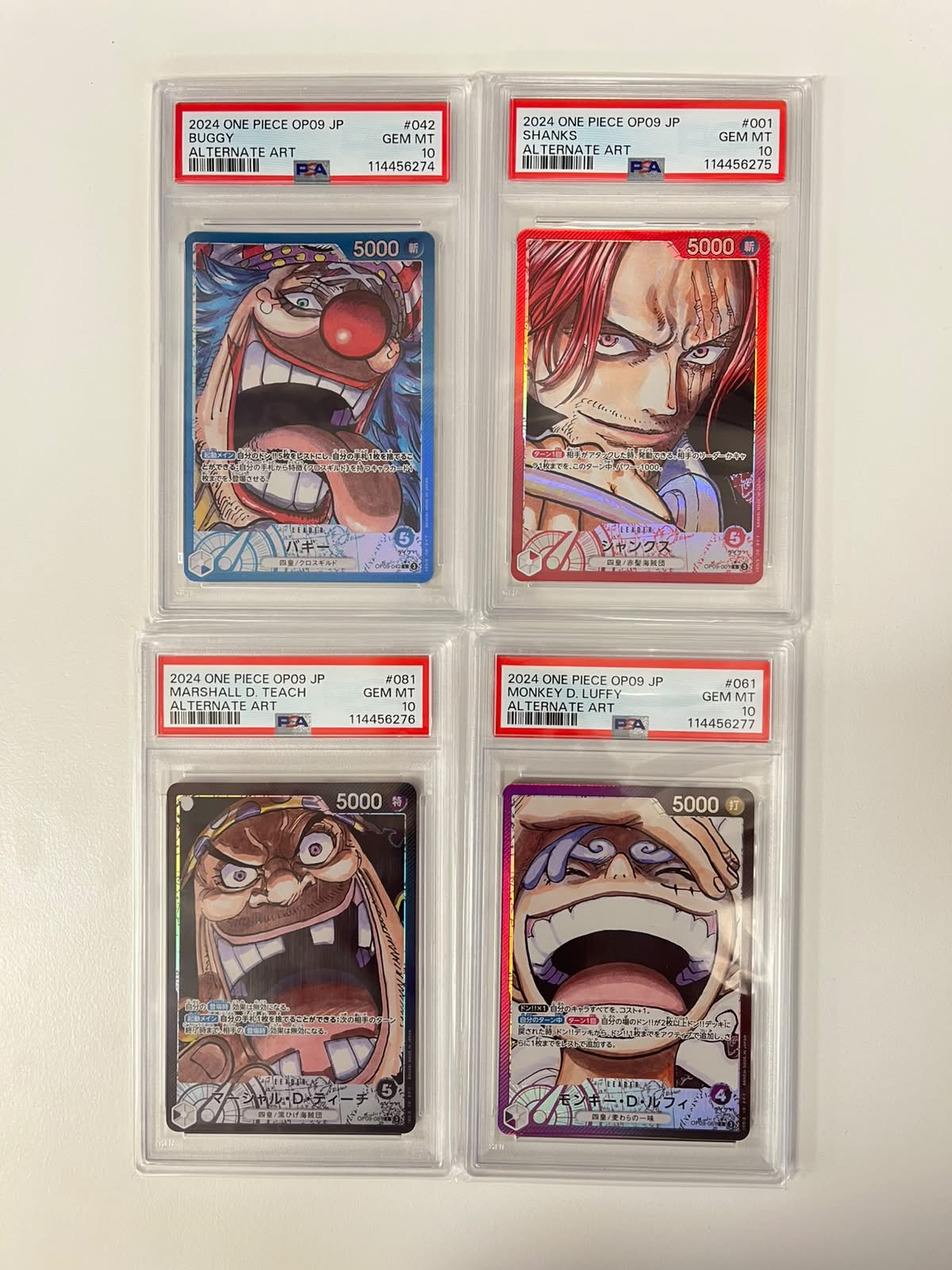 Monkey.D.Luffy/Buggy/Shanks/Marshall.D.Teach Sequential Set Leader Alt Art OP09 JAP PSA 10