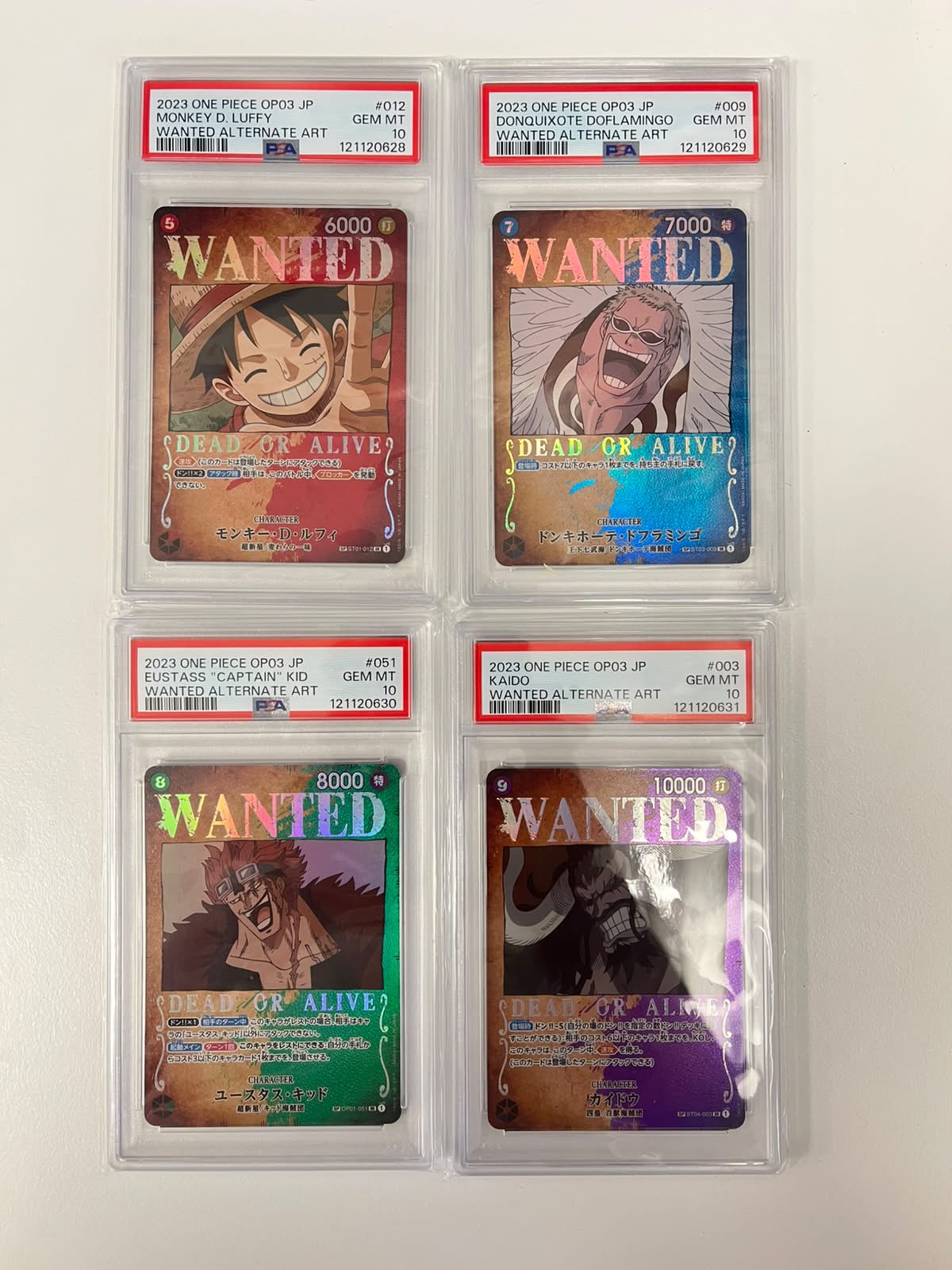 Monkey.D.Luffy/Doflamingo/Eustass"Captain"Kid/Kaido Sequential Set Wanted Rare OP03 JAP PSA 10 (Copy)
